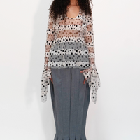 Blouse ample en tulle transparent